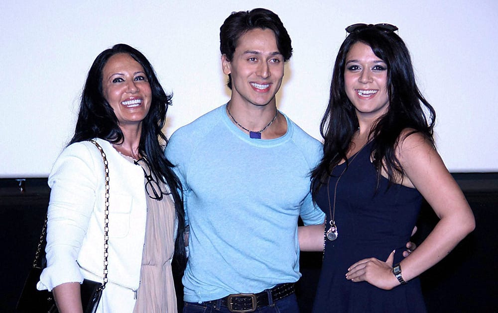 Actor Tiger Shroff, his mother Ayesha (L) and sister Krishna Shroff during the trailer launch of film Heropanti in Mumbai.