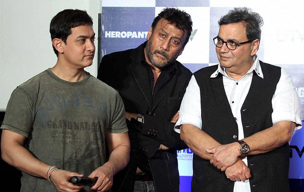 Bollywood actor Aamir Khan and Jackie Shroff and filmmaker Subhash Ghai during the trailer launch of film Heropanti in Mumbai.