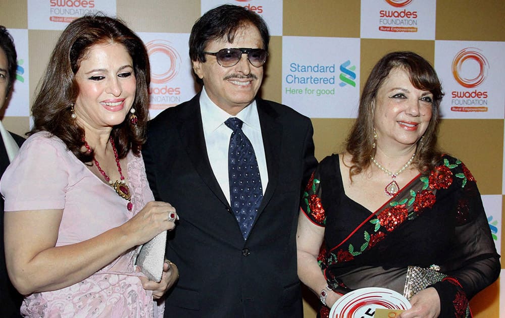 Bollywood actor Sanjay Khan with his wife Zarine Khan (R) and sister Dilshad, during the fundraiser in support of Swades Foundation in Mumbai.