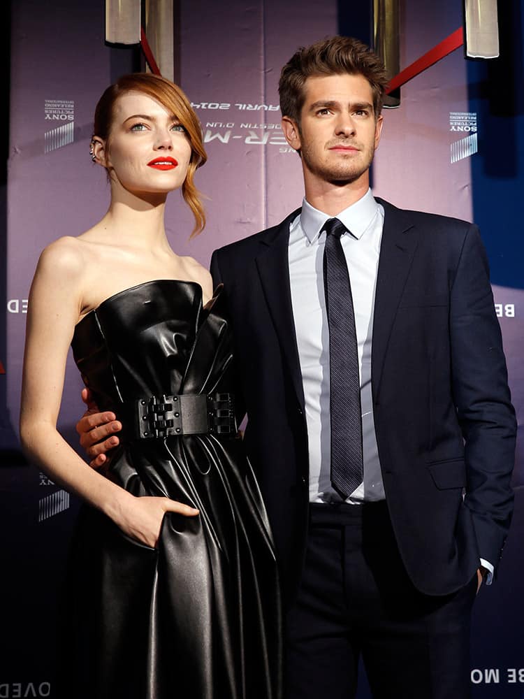 British actor Andrew Garfield and US actress Emma Stone pose for photographers before the French premiere of the movie The Amazing Spider-Man 2, in Paris.