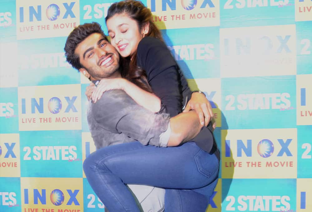 Arjun Kapoor and Alia Bhatt, share a candid moment during the event in Inox, Amanora Town Centre in Pune. Pic Courtesy: DNA