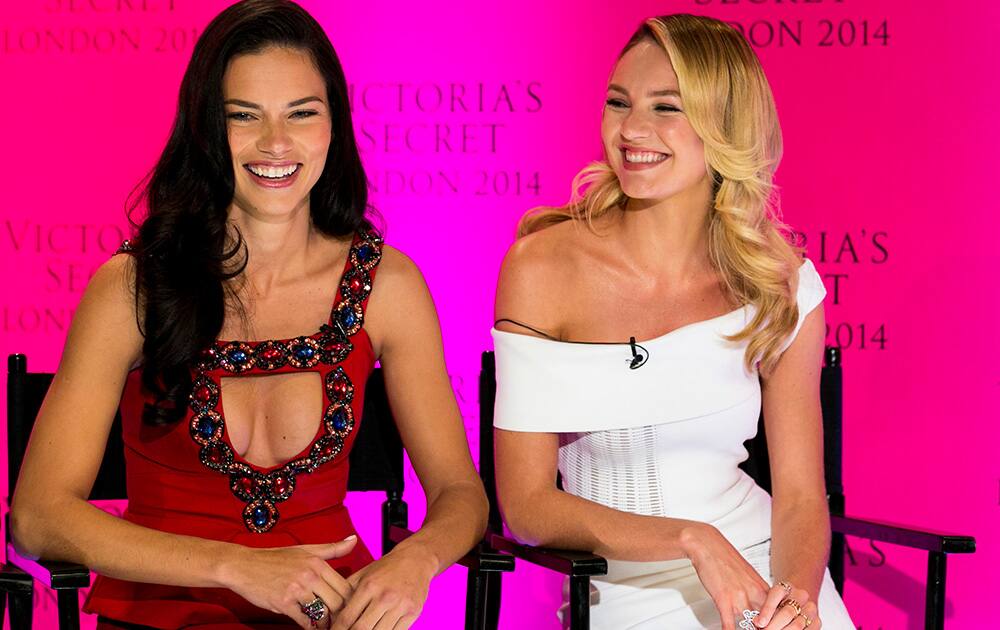 Victoria's Secret models Adriana Lima and Candice Swanepoel during a press conference at the Victoria's Secret New Bond Street store in central London.