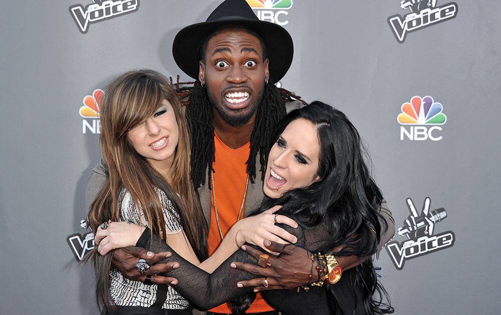 From left, Christina Grimmie, Delvin Choice, and Kat Perkins appear at `The Voice` Top 12 Red Carpet Event in Universal City, Calif. 