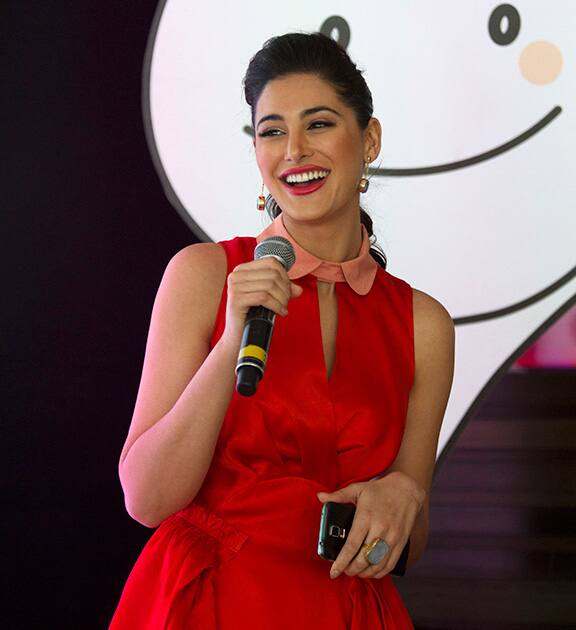 Nargis Fakhri speaks during the unveiling of Samsung's ChatOn application for instant messaging and file sharing, in New Delhi.