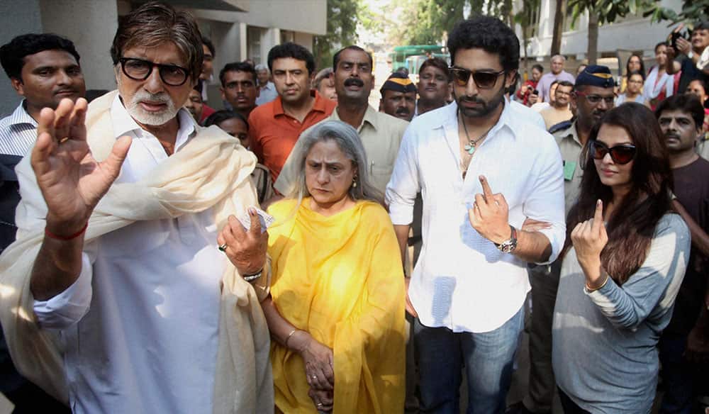BOLLYWOOD ACTORS AMITABH BACHCHAN ALONG WITH FAMILY MEMBERS JAYA, AISHWARYA AND ABHISHEK AFTER CASTING THEIR VOTES FOR THE LOK SABHA ELECTIONS IN MUMBAI.