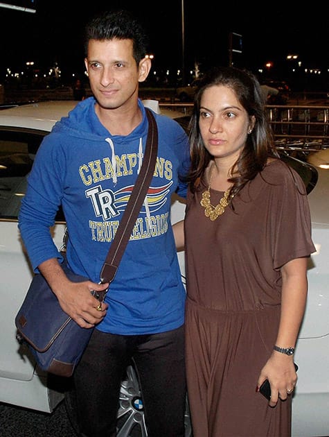 Sharman Joshi with wife departs from Mumbai CST International Airport for Florida, USA to participate in IIFA 2014 awards ceremony.