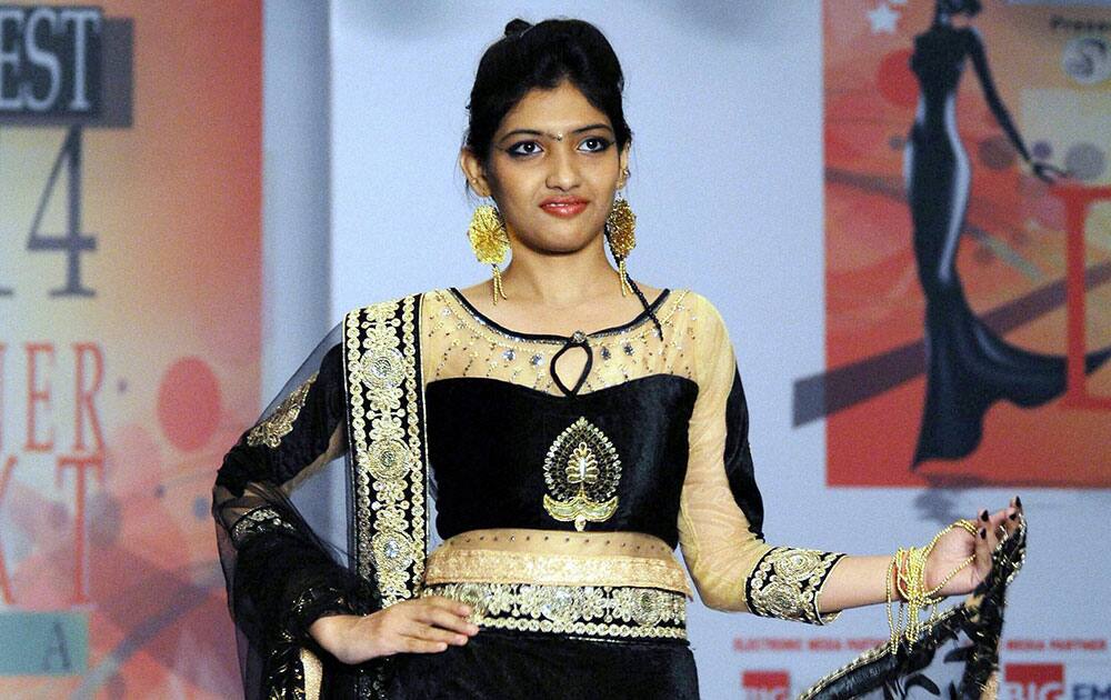 A Model walks the ramp during a fashion event in Ranchi.