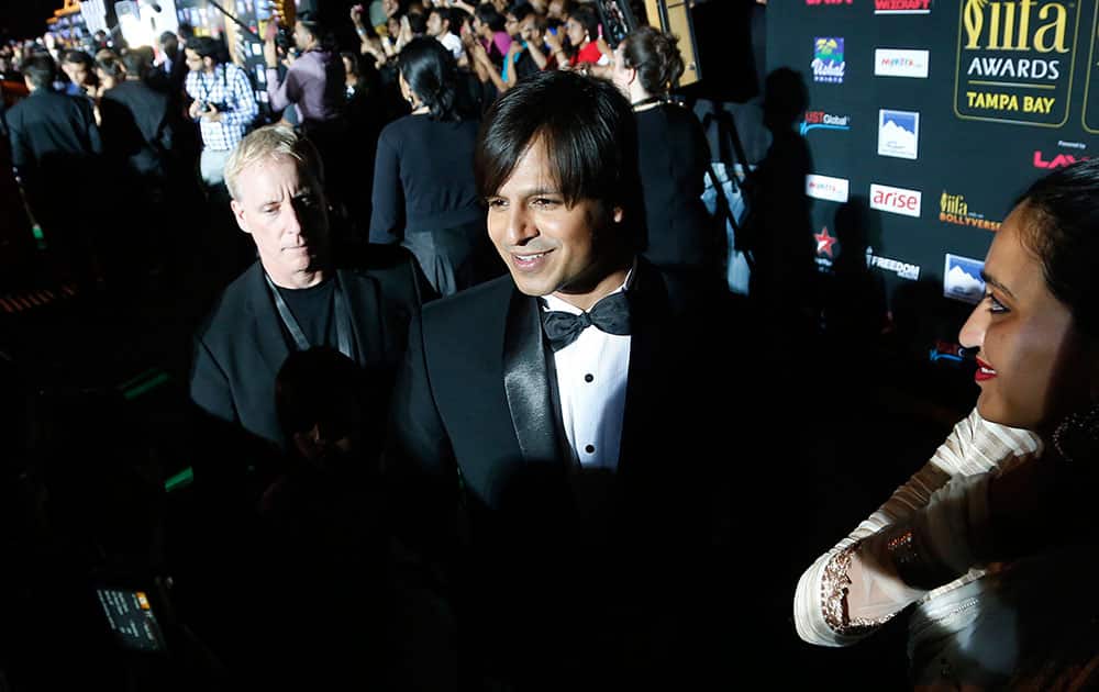Vivek Oberoi walks the green carpet as he arrives for the 15th annual International Indian Film Awards on Saturday, April 26, 2014, in Tampa, Fla.