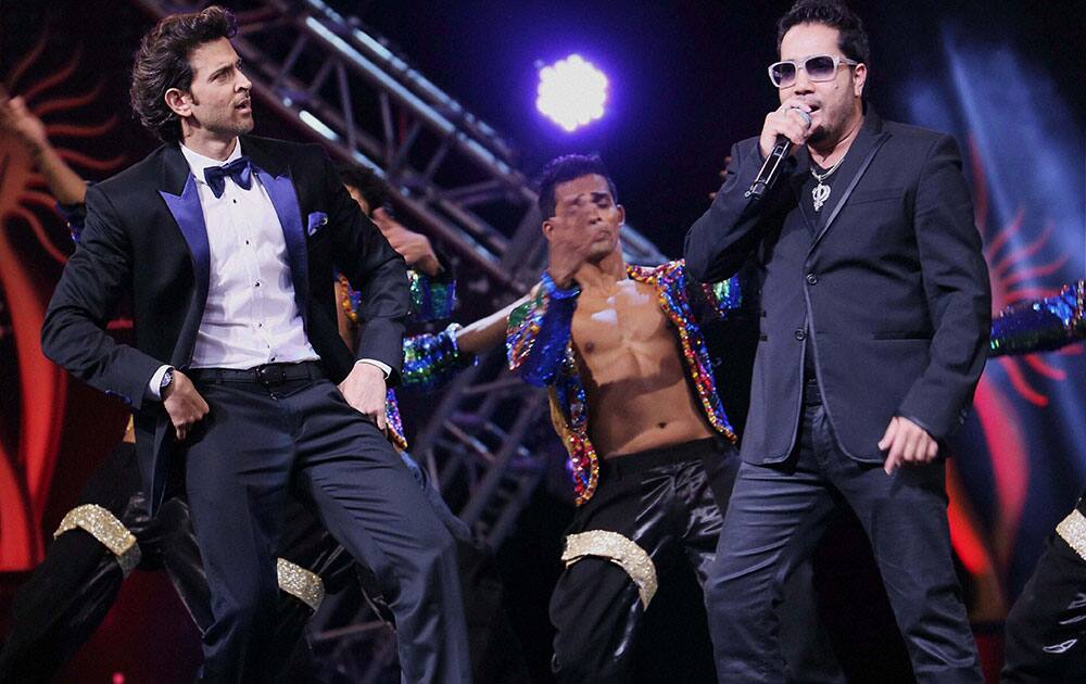 Bollywood actor Hrithik Roshan and singer Mika Singh performing during the IIFA Technical Awards in Tampa, Florida.