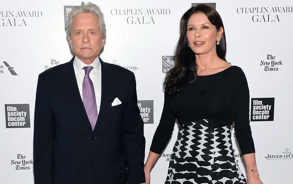 Actors Michael Douglas and wife Catherine Zeta-Jones attend the 41st Annual Chaplin Award Gala honoring Rob Reiner at Avery Fisher Hall in New York.