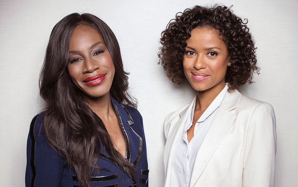 Director Amma Asante, left, and British actress Gugu Mbatah-Raw pose for a portrait in promotion of their upcoming film, `Belle,` in New York. 