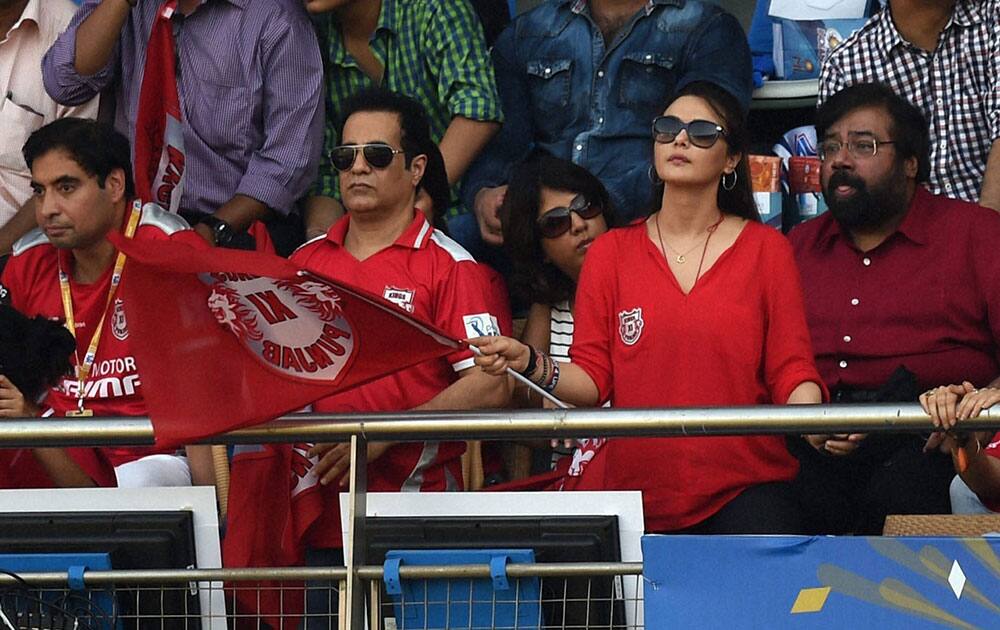 Kings XI Punjab owner Preiti Zinta cheers during an IPL 7 match against Mumbai Indians in Mumbai.