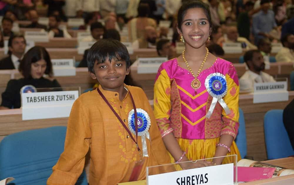 Best Child Artist award winner Sadhana with Shreyas at the 61st National Film Awards 2013 function in New Delhi.