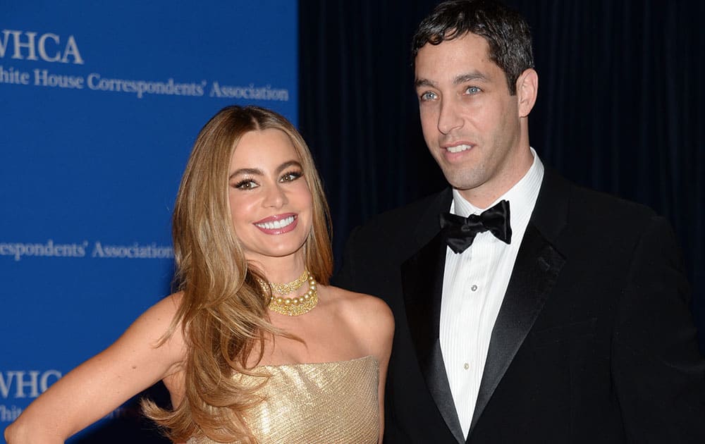 Sofia Vergara, left, and Nick Loeb arrive at the White House Correspondents' Association Dinner at the Washington Hilton Hotel.