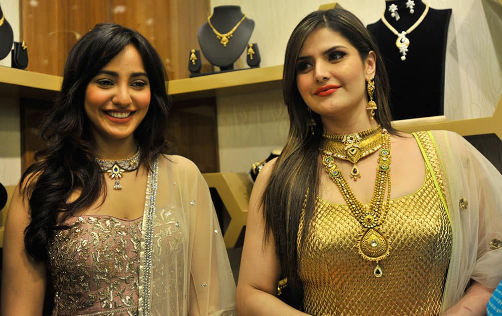 Neha Sharma and Zarine Khan at the opening of Zee Bangles in the city Pune at a recent function. DNA