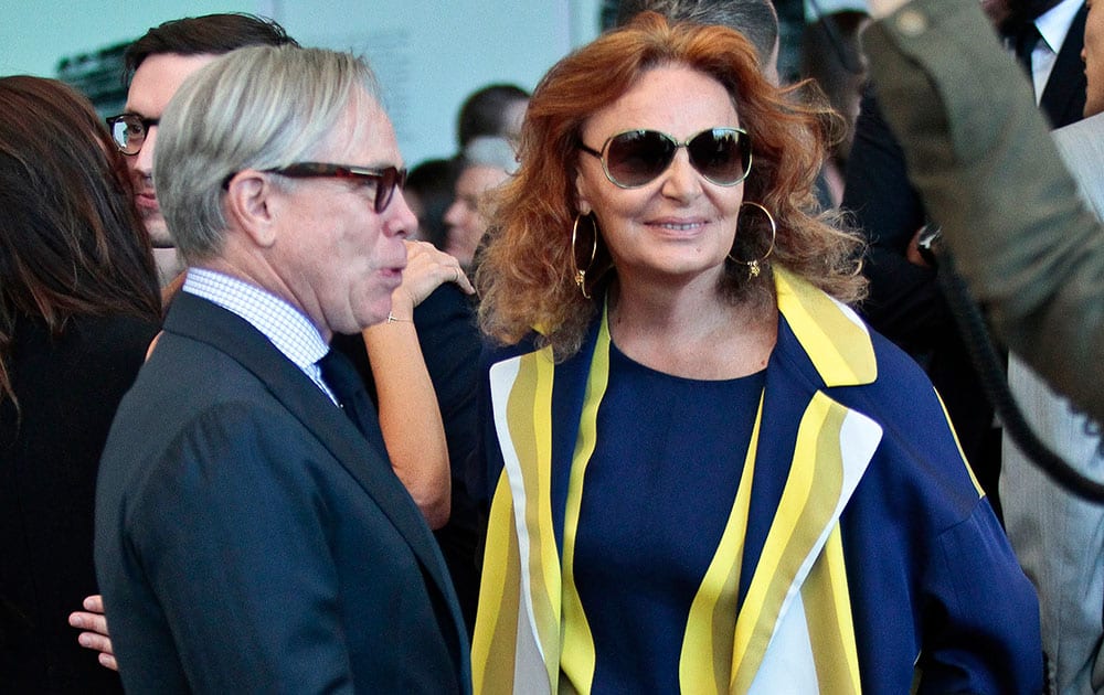 Fashion designers Tommy Hilfiger, left, and Diane von Furstenberg appear at a dedication ceremony for the Anna Wintour Costume Center, at the Metropolitan Museum of Art in New York.