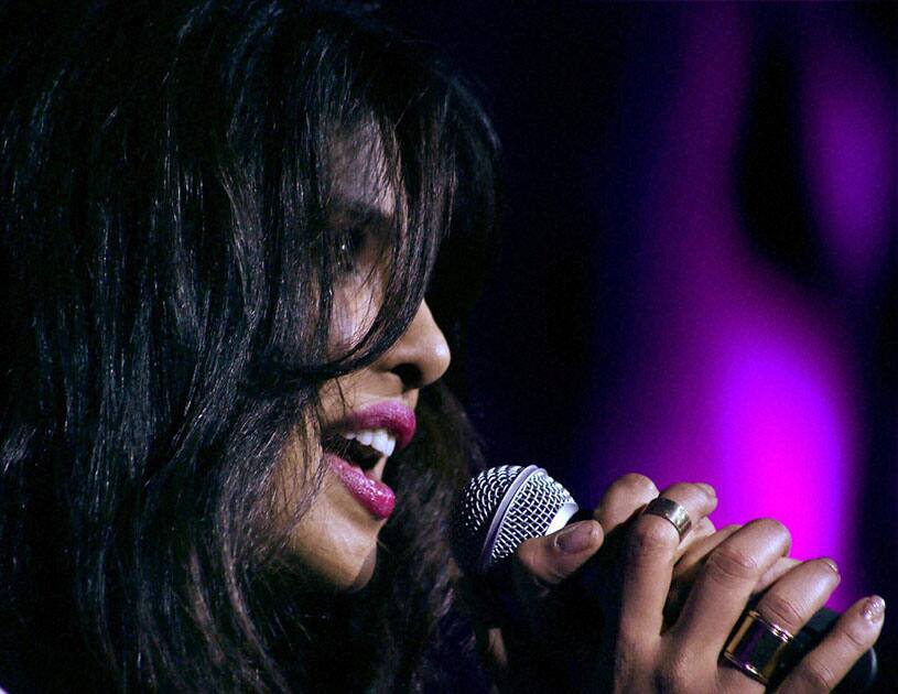 Bollywood actress Priyanka Chopra sings a song from her album in Mumbai.