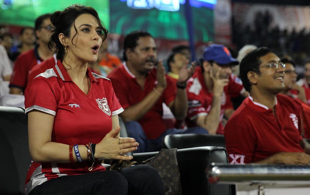 Kings X1 Punjab owner Preity Zinta celebrates during the IPL 7 match between KXIP and Chennai Super Kings at the Barabati Stadium in Cuttack.