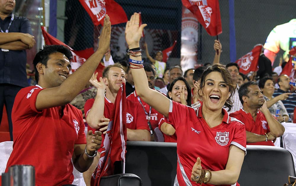 Kings X1 Punjab owner Preity Zinta celebrates during the IPL 7 match between KXIP and Chennai Super Kings at the Barabati Stadium in Cuttack.