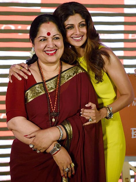 Bollywood actress Shilpa Shetty with her mother Sunanda Shetty during an event to celebrate Mothers Day in Mumbai.