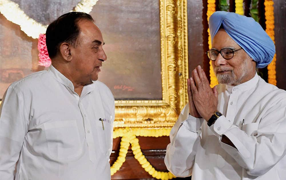 Prime Minister Manmohan Singh with BJP leader Subramanian Swami during Rabindra Nath Tagore's 153rd birth aniversary at Parliament House in New Delhi.