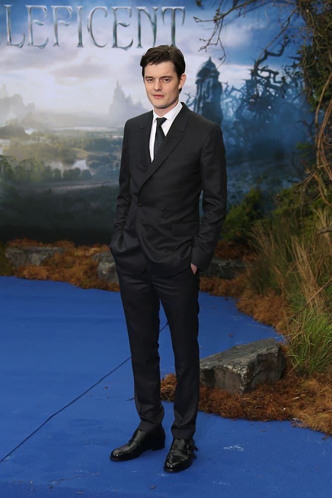 Actor Sam Riley arrives for the Maleficent exhibit in Kensington Gardens, London.