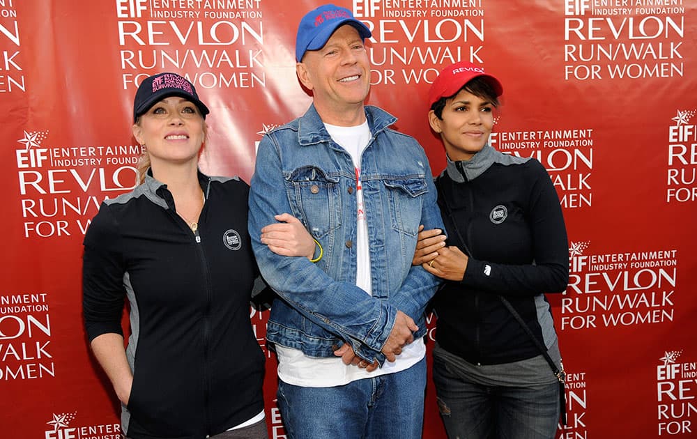 Actors Christina Applegate, Bruce Willis and Halle Berry pose together before the 21st Annual EIF Revlon Run/Walk for Women, in Los Angeles.