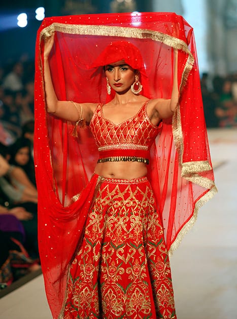 A model presents a creation by designer Yasan Zaman on the second day of Bridal Couture Week in Karachi, Pakistan.