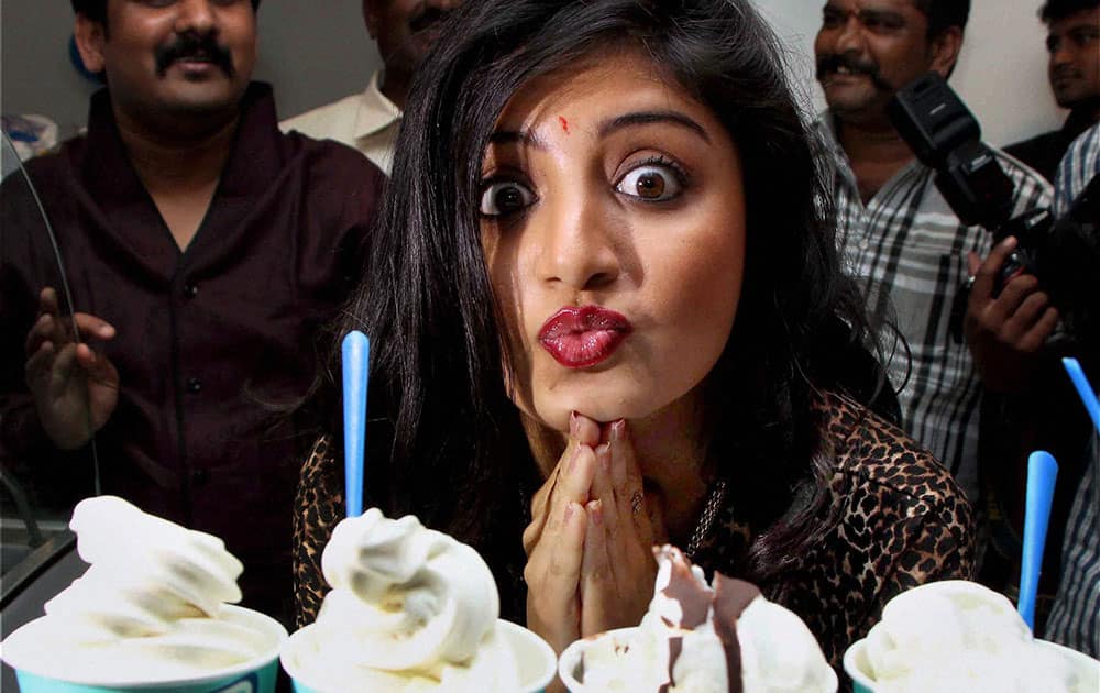 Actress Poonam Kaur tastes gelato-Italian-low fat yoghurt, at the launch of Italy’s famous chain of Ci-Gusta at Banjara Hills in Hyderabad.