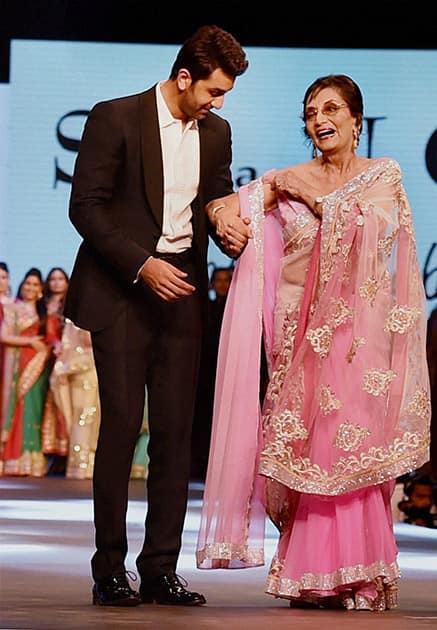 Ranbir Kapoor and veteran actress Sadhana walk the ramp during a fashion show to support Cancer patients in Mumbai.