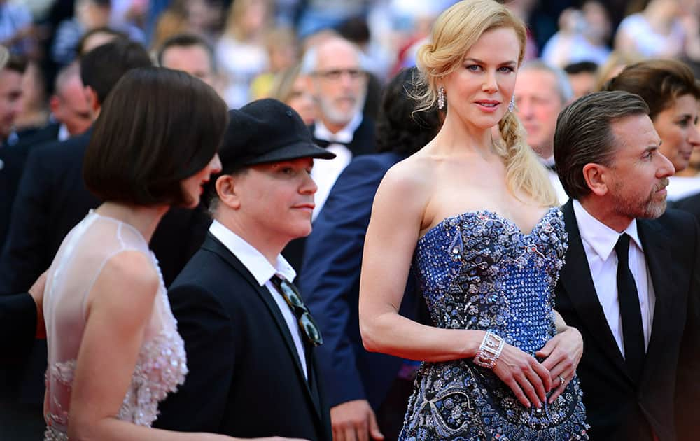 From left, actress Paz Vega, director Olivier Dahan, actors Nicole Kidman and Tim Roth pose on the red carpet during the opening ceremony and the screening of Grace of Monaco at the 67th international film festival, Cannes.