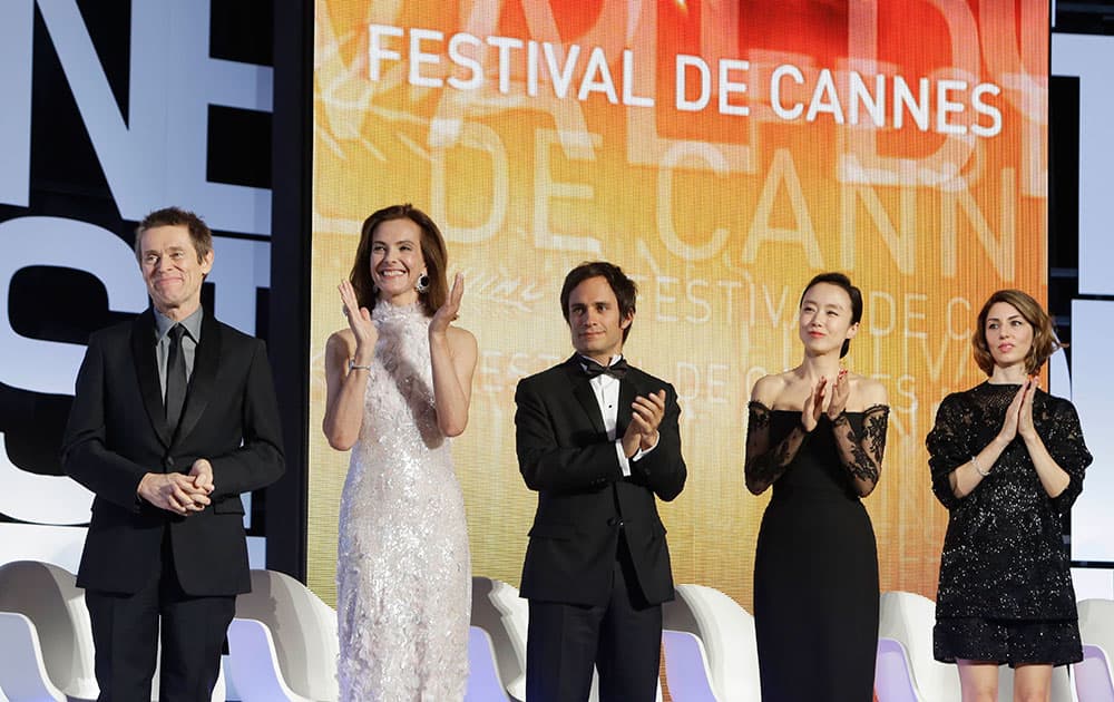 Jury members from left, Willem Dafoe, Carole Bouquet, Gael Garcia Bernal, Jeon Do-yeon and Sofia Coppola during the opening ceremony ahead of the screening of Grace Of Monaco at the 67th international film festival, Cannes.