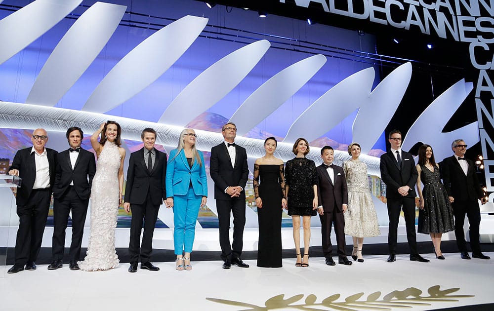 Jury members, Gael Garcia Bernal, Carole Bouquet, Willem Dafoe, president of the jury Jane Campion, Master of Ceremonies Lambert Wilson, jury members Jeon Do-yeon, Sofia Coppola, Jia Zhangke, Leila Hatami, and Nicolas Winding Refn during the opening ceremony ahead of the screening.