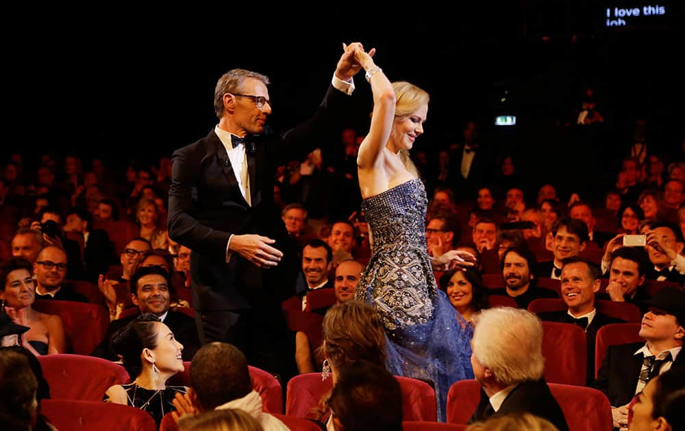 Master of Ceremonies Lambert Wilson, left, and actress Nicole Kidman during the opening ceremony ahead of the screening of Grace Of Monaco at the 67th international film festival, Cannes.