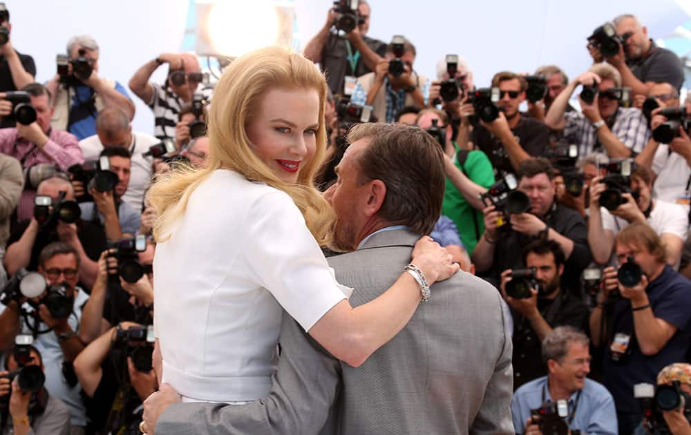 Actress Nicole Kidman, left, and actor Tim Roth pose for photographers during a photo call for the film Grace of Monaco at the 67th international film festival, Cannes.