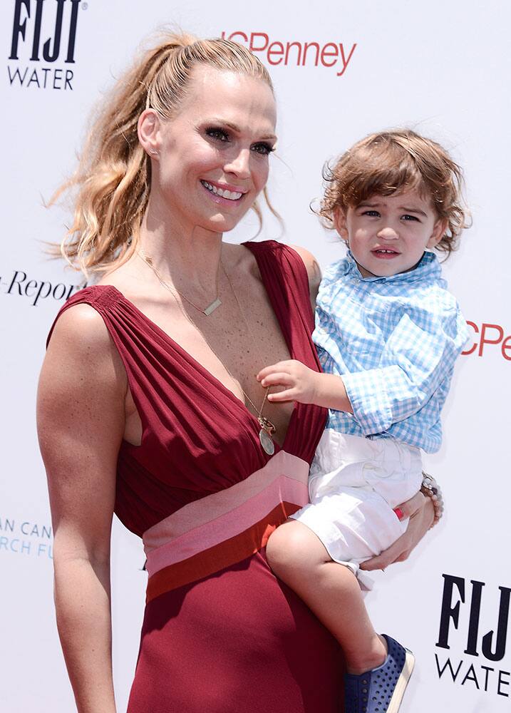 Actress Molly Sims, left, and her son Brooks Stuber attend Super Saturday LA benefiting the Ovarian Cancer Research Fund at Barker Hangar in Santa Monica, Calif.