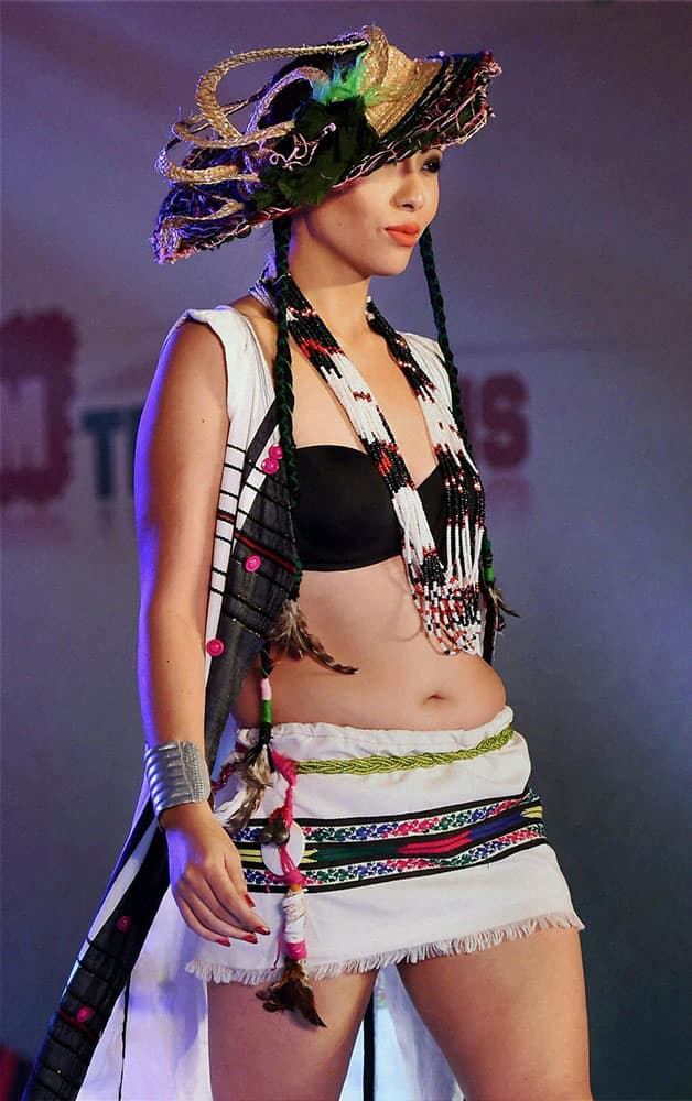 A model displays designer creation during the North East festival in Mumbai.