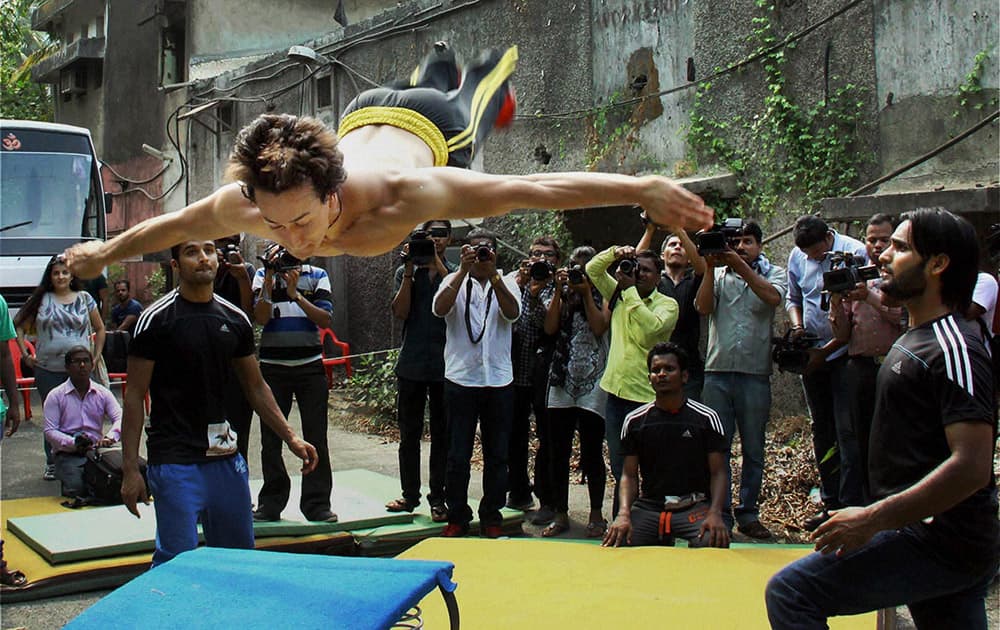 Tiger Shroff performs a parkour stunt to promote his upcoming film Heropanthi in Mumbai.