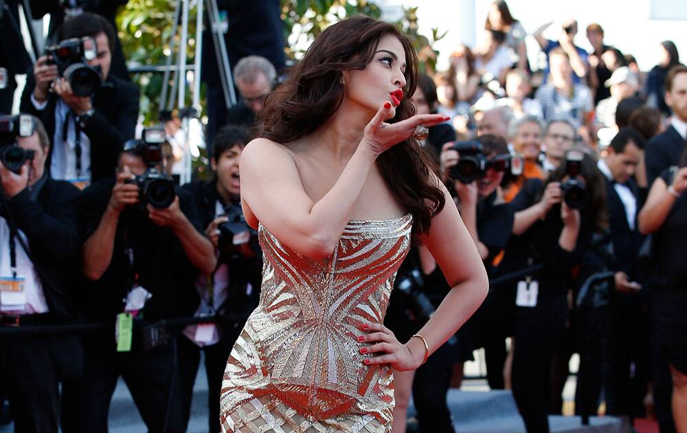 Actress Aishwarya Rai Bachchan poses for photographers as she arrives for the screening of Two Days, One Night (Deux jours, une nuit) at the 67th international film festival, Cannes, southern France.