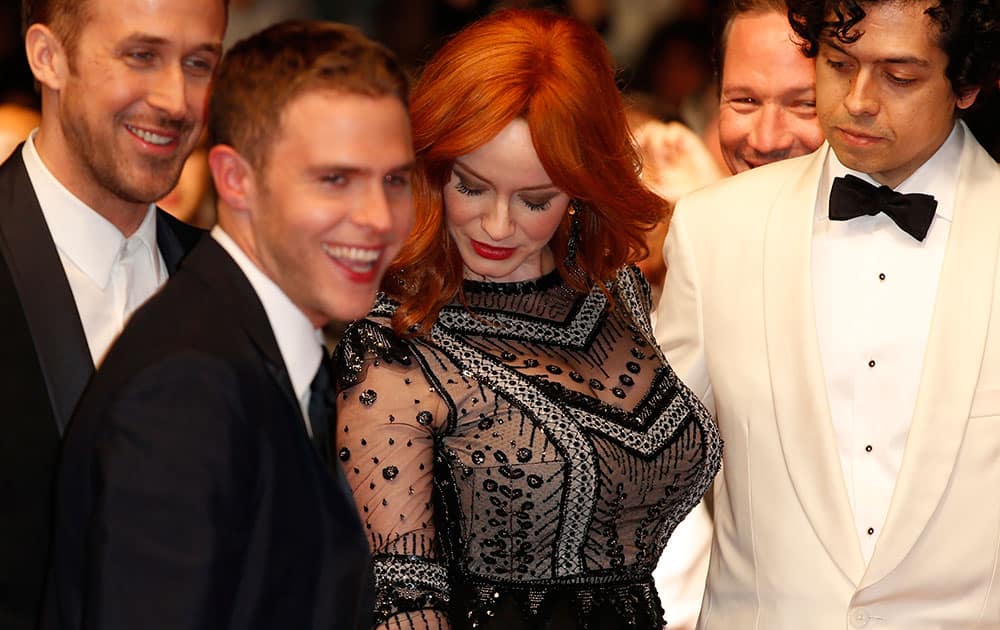 From left, director Ryan Gosling, actor Iain De Caestecker, actress Christina Hendricks and Geoffrey Arend arrive for the screening of Two Days, One Night (Deux jours, une nuit) at the 67th international film festival, Cannes, southern France.