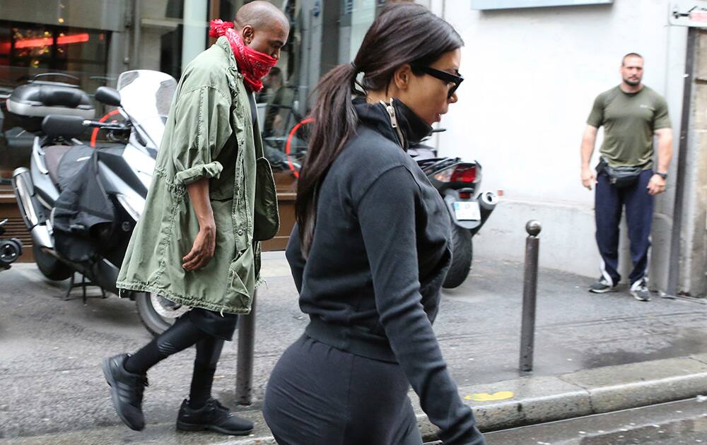 Kim Kardashian and U.S rap singer Kanye West leave a fitness center in Paris. The gates of the Chateau de Versailles, once the digs of Louis XIV, will be thrown open to Kim Kardashian, Kanye West and their guests for a private evening this week ahead of their marriage.