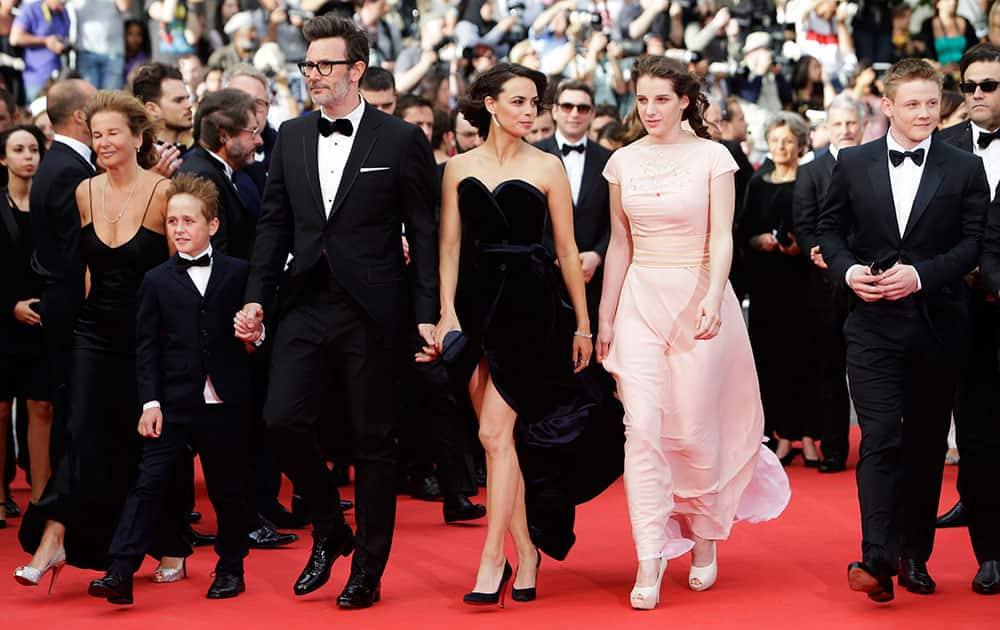 Actor Abdul Khalim Mamatsueiv, director Michel Hazanavicius, actress Berenice Bejo, actor Zukhra Duishvili and actor Maxim Emelianov arrive for the screening of The Search at the 67th international film festival, Cannes.