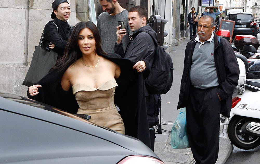 Kim Kardashian leaves a luxury shop in Paris. The gates of the Chateau de Versailles, once the digs of Louis XIV, will be thrown open to Kim Kardashian, Kanye West and their guests for a private evening this week ahead of their marriage.