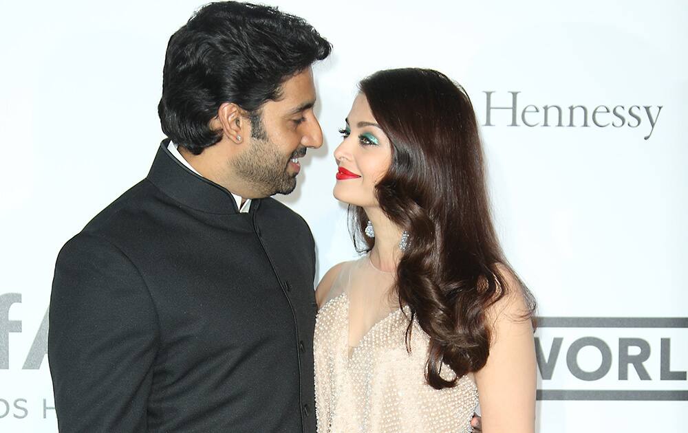 Abhishek Bachchan and Aishwarya Rai Bachchan arrive at the amfAR Cinema Against AIDS benefit at the Hotel du Cap-Eden-Roc, during the 67th international film festival, in Cap d'Antibes, southern France.