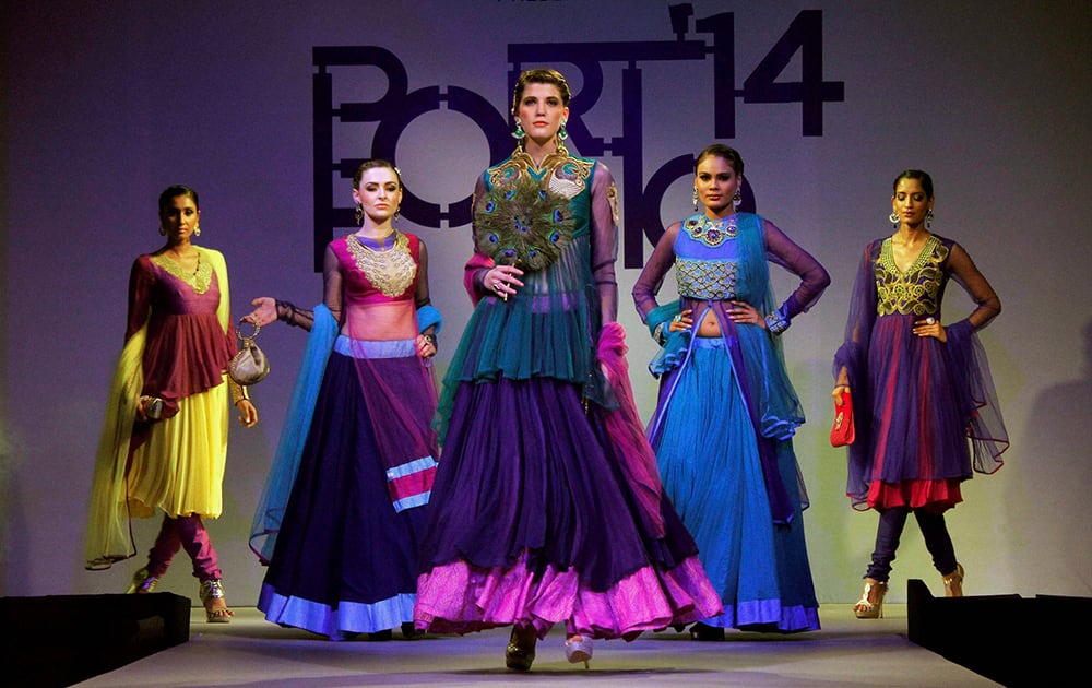 Models walk the ramp during a fashion show in Jaipur.