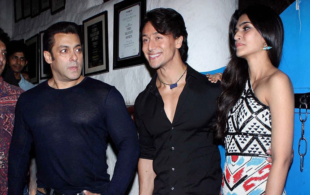 Bollywood actors Salman Khan, Tiger Shroff and Kriti Sanon during the success party of the film Heropanti in Mumbai.