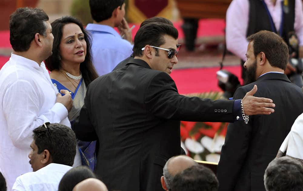 Actress and BJP politician Hema Malini and Salman Khan at the swearing-in ceremony of Narendra Modi at Rashtrapati Bhawan in New Delhi. dna