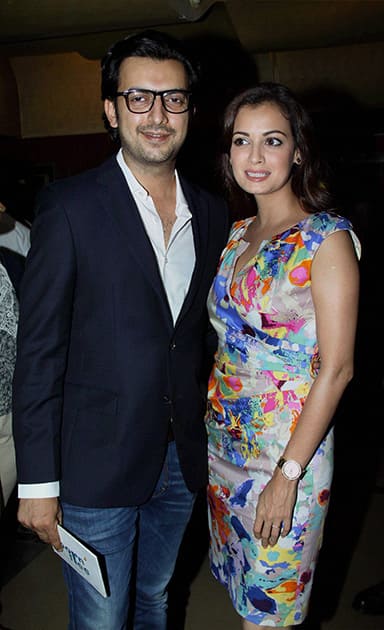 Dia Mirza (R) poses with partner Sahil Sangha during the trailer launch of the forthcoming Hindi film 'Bobby Jasoos' in Mumbai.