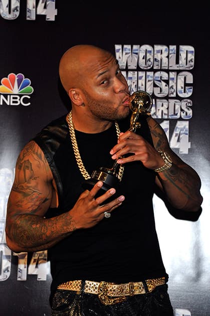 Tramar Lacel Dillard, better known by his stage name Flo Rida poses after he received the Outstanding contribution to Dance MusicAward during the World Music Awards ceremony in Monaco.