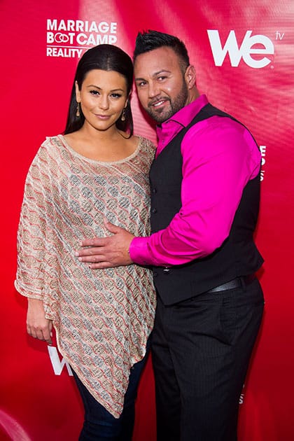 Jenni 'JWoww' Farley and Roger Mathews attend WE tv's 'Marriage Boot Camp: Reality Stars' party.